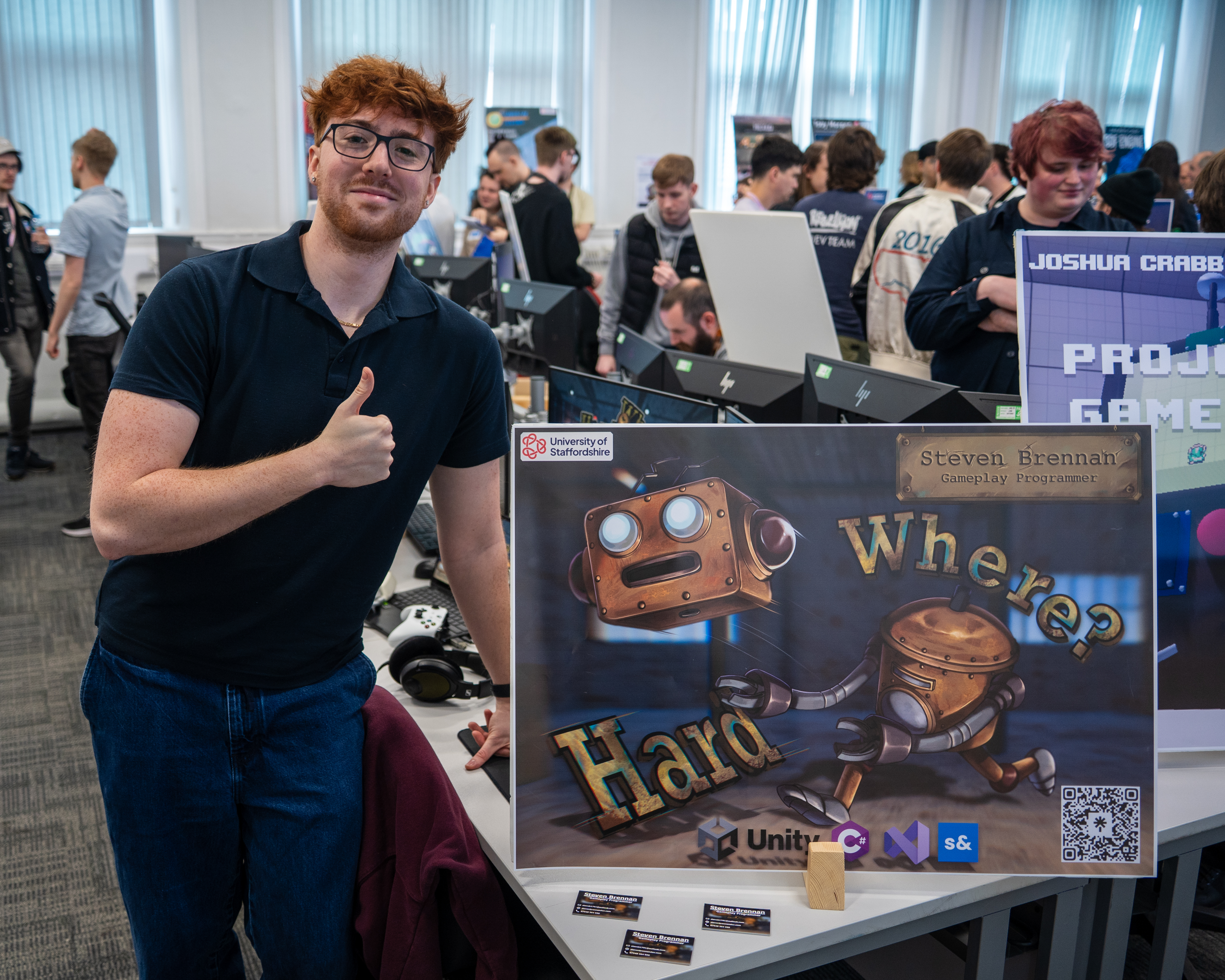 Steven Brennan presenting HardWhere at a convention